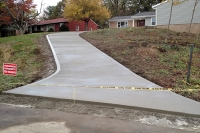 new driveway with steep grade and curve
